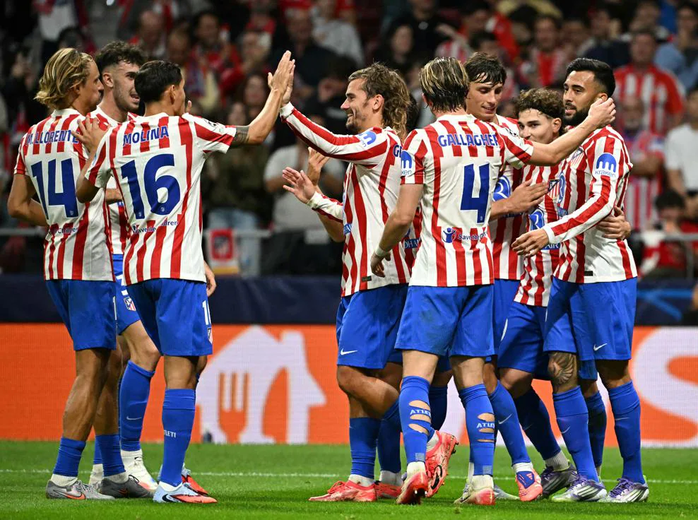 Los jugadores del Atlético Madrid celebran un gol durante el partido contra el Frankfurt